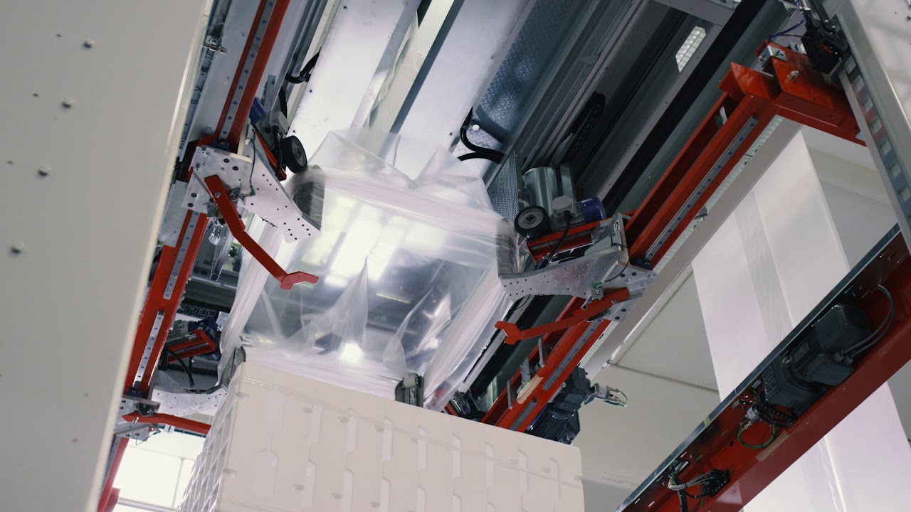 Stretch hood system for industrial pallet packaging with elastic hood film